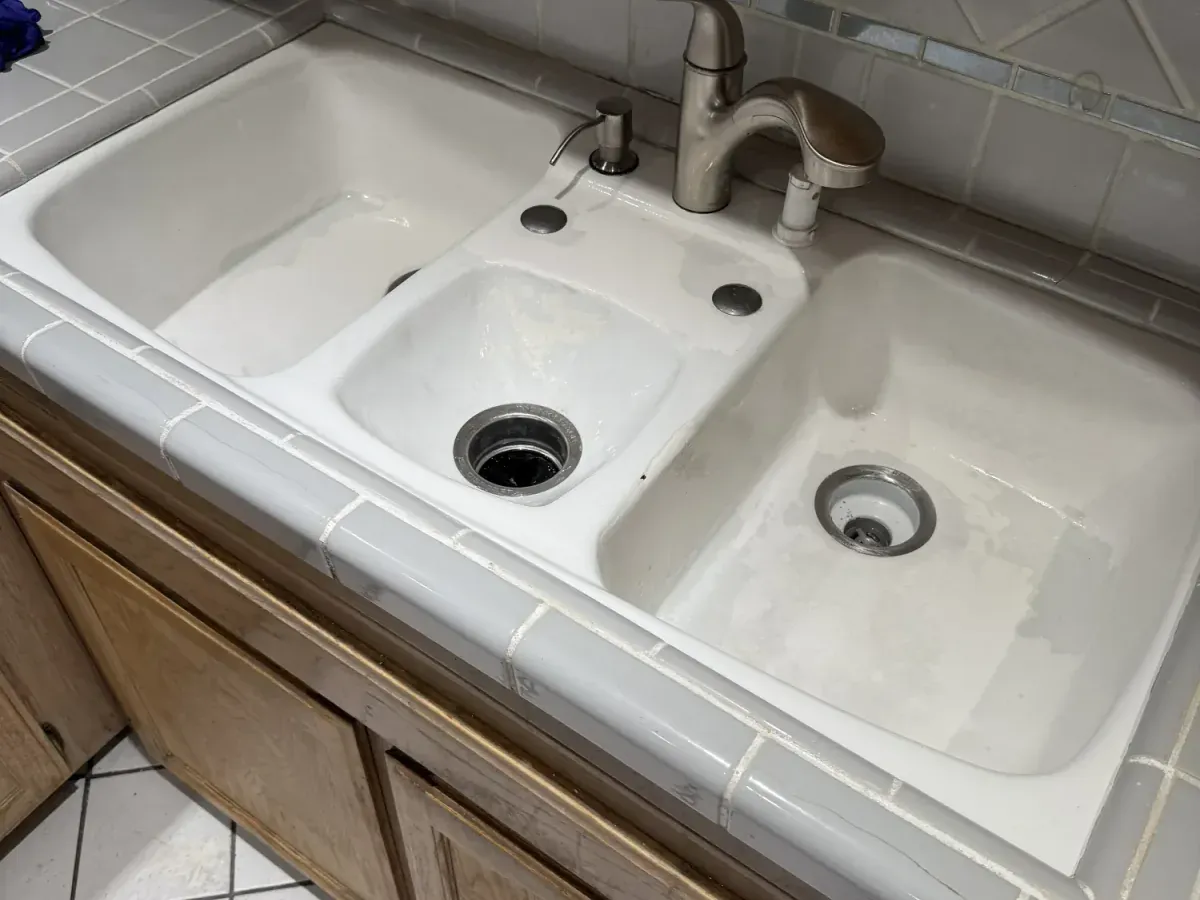 Worn sink before refinishing in Los Angeles