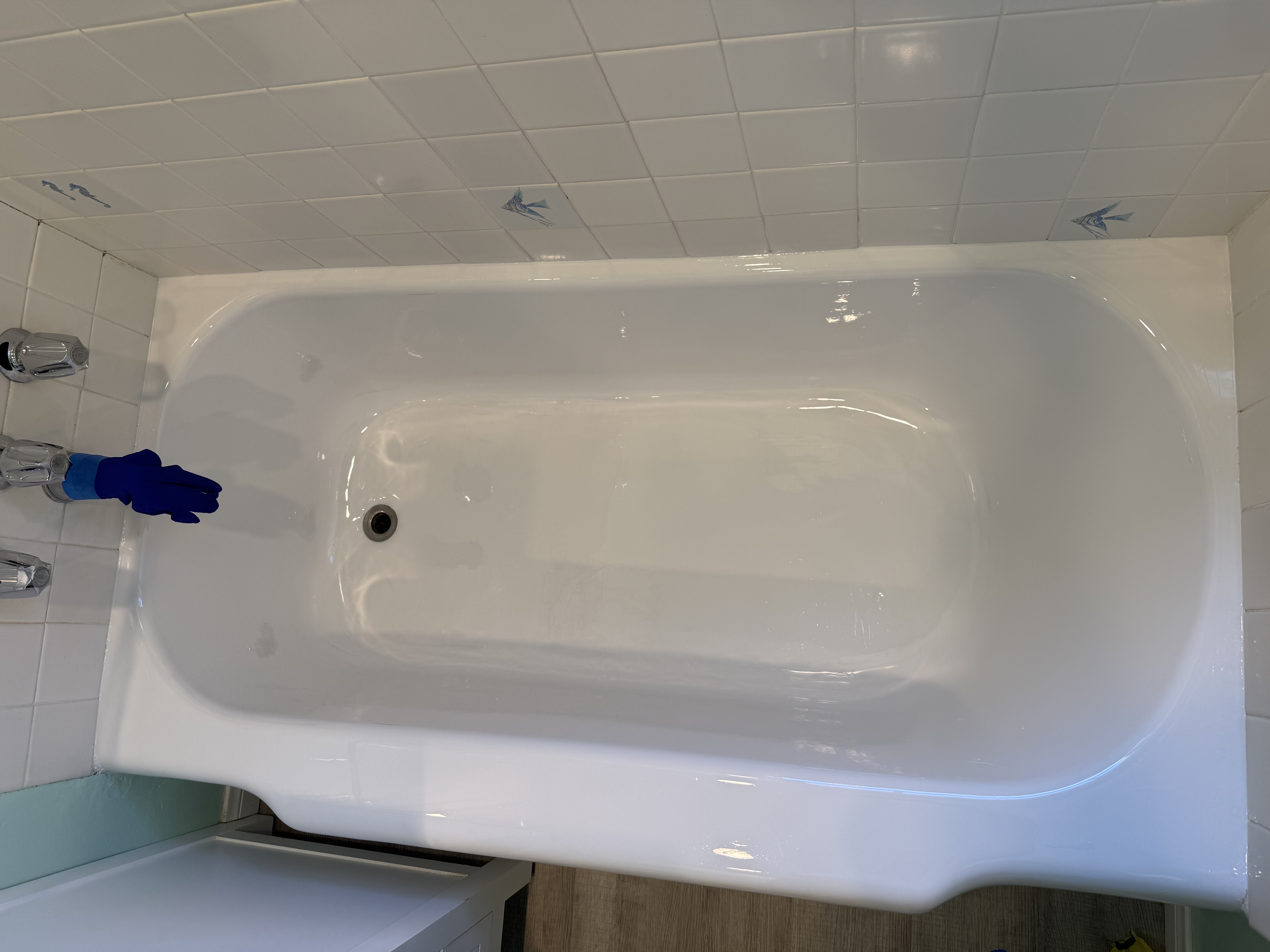 Prepping the tub for new acrylic coating