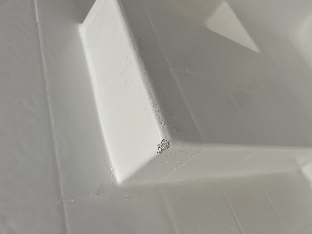 Severe fiberglass tub crack before repair