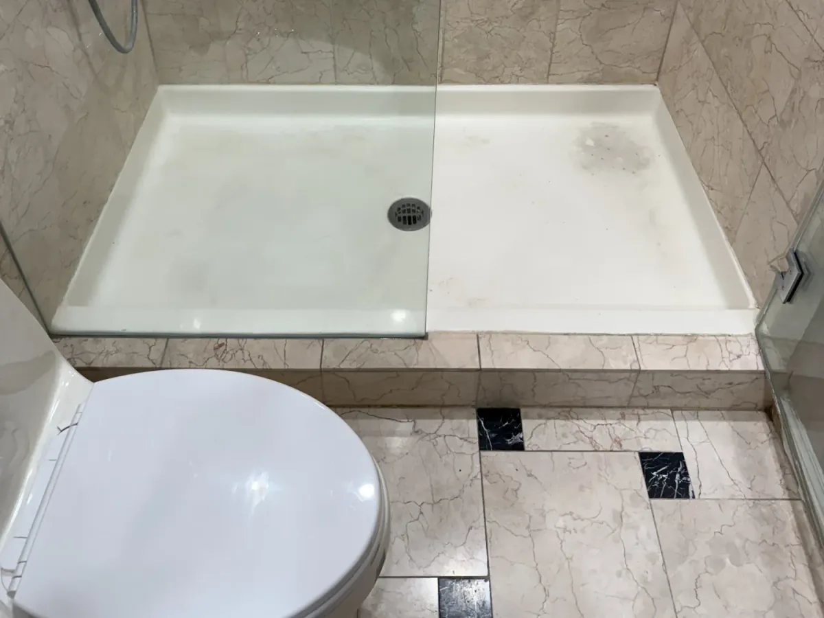 Damaged shower stall before restoration in Los Angeles