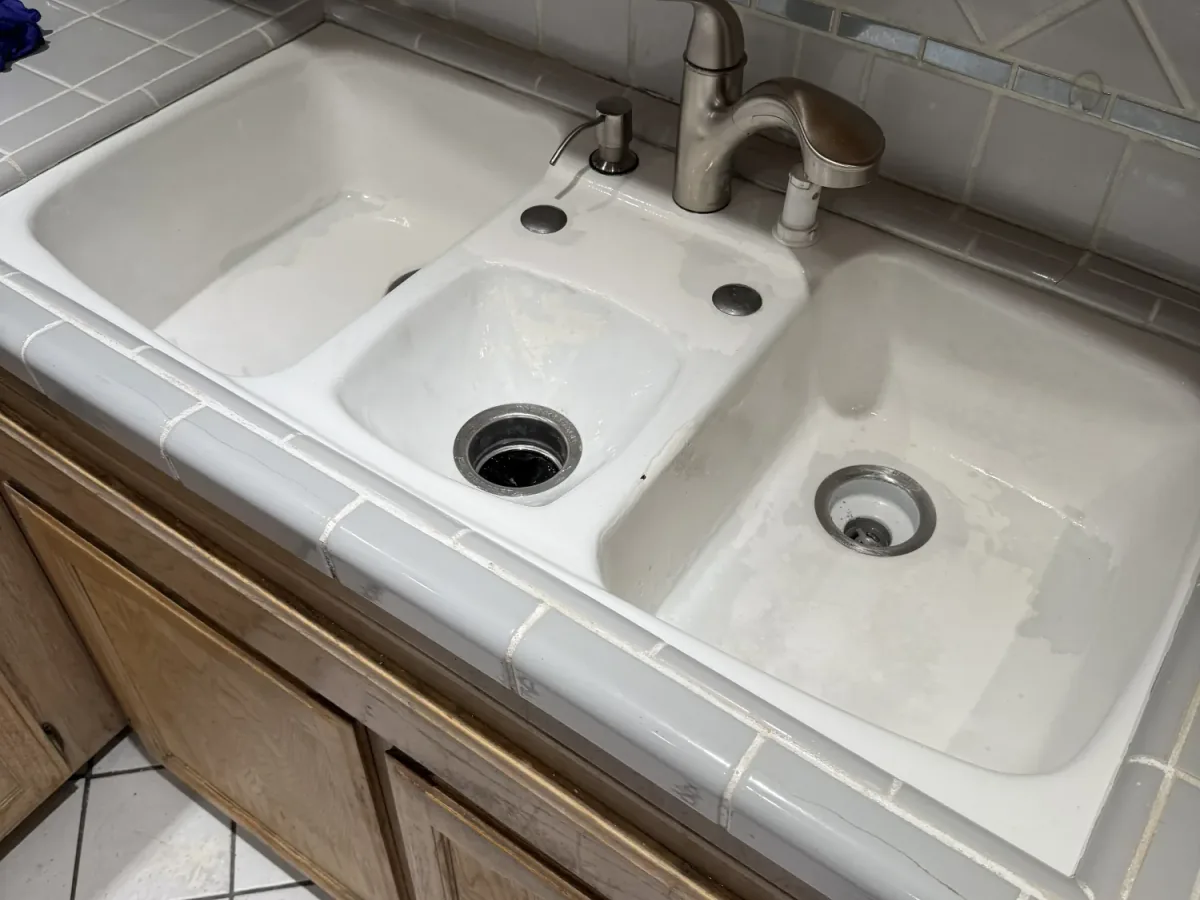 Worn sink before refinishing in Los Angeles