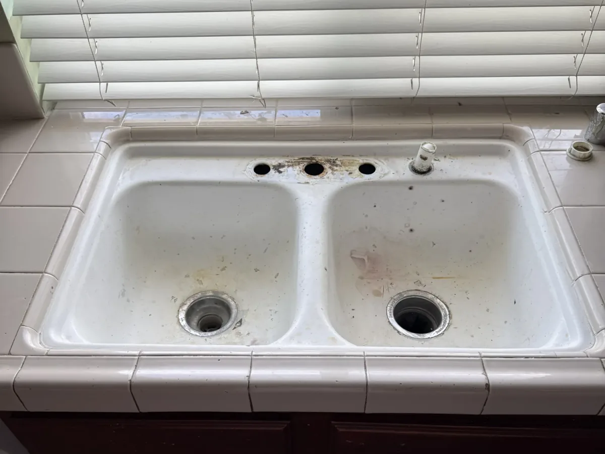 Chipped porcelain sink before restoration in Los Angeles